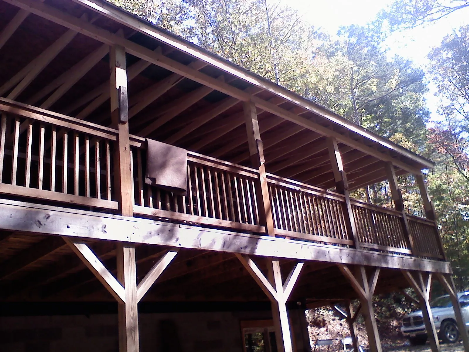 Timber framing under a new elevated porch and deck — Roof Leak Repair in Satartia by Roofing Brothers